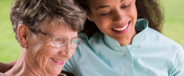 Two women smiling